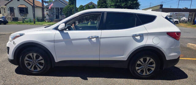 hyundai santa fe 2016 5XYZTDLB2GG310660 image hyundai santa fe 2016 5XYZTDLB2GG310660 image
